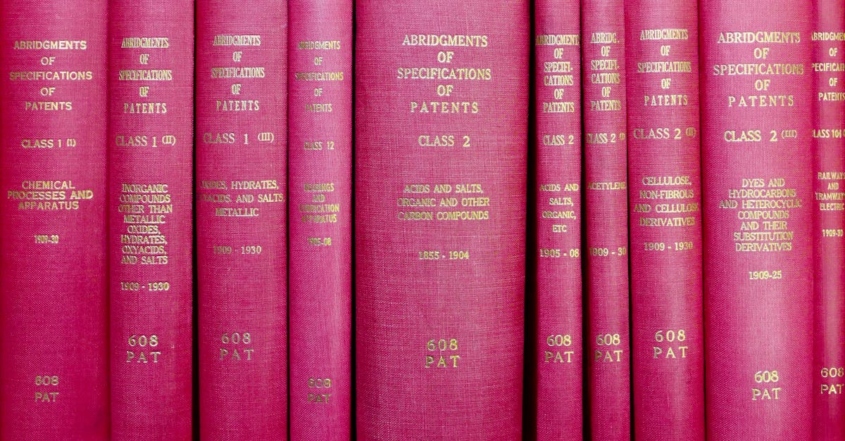 A row of red hardcover books titled 'Abridgments of Specifications of Patents'.