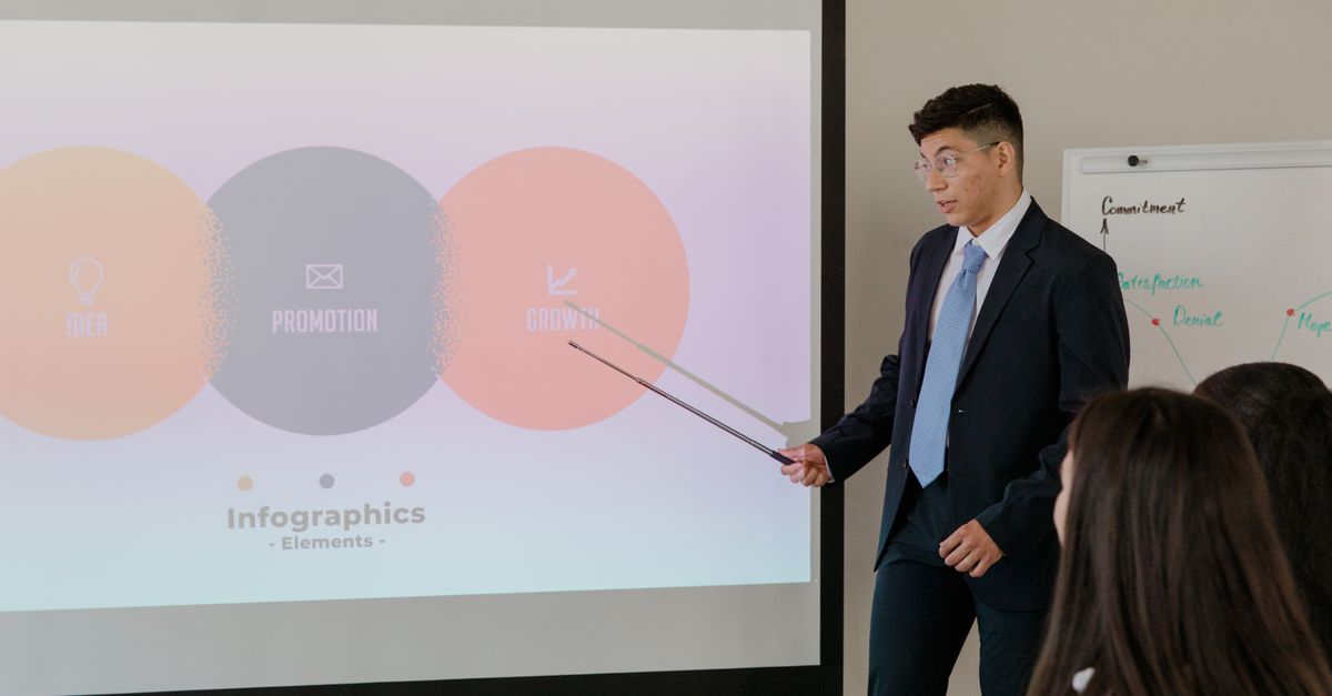 Professional business presentation featuring infographic elements on a screen.